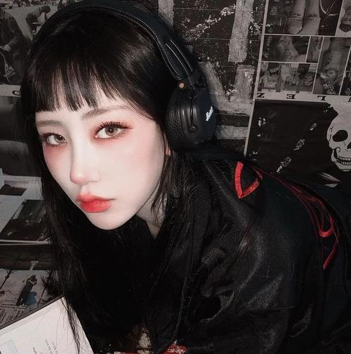 苹果手机拍照时如何去除黑色刘海？